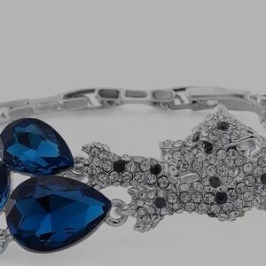 Simulated Blue Sapphire and Austrian Crystal Panther Bracelet in Silvertone